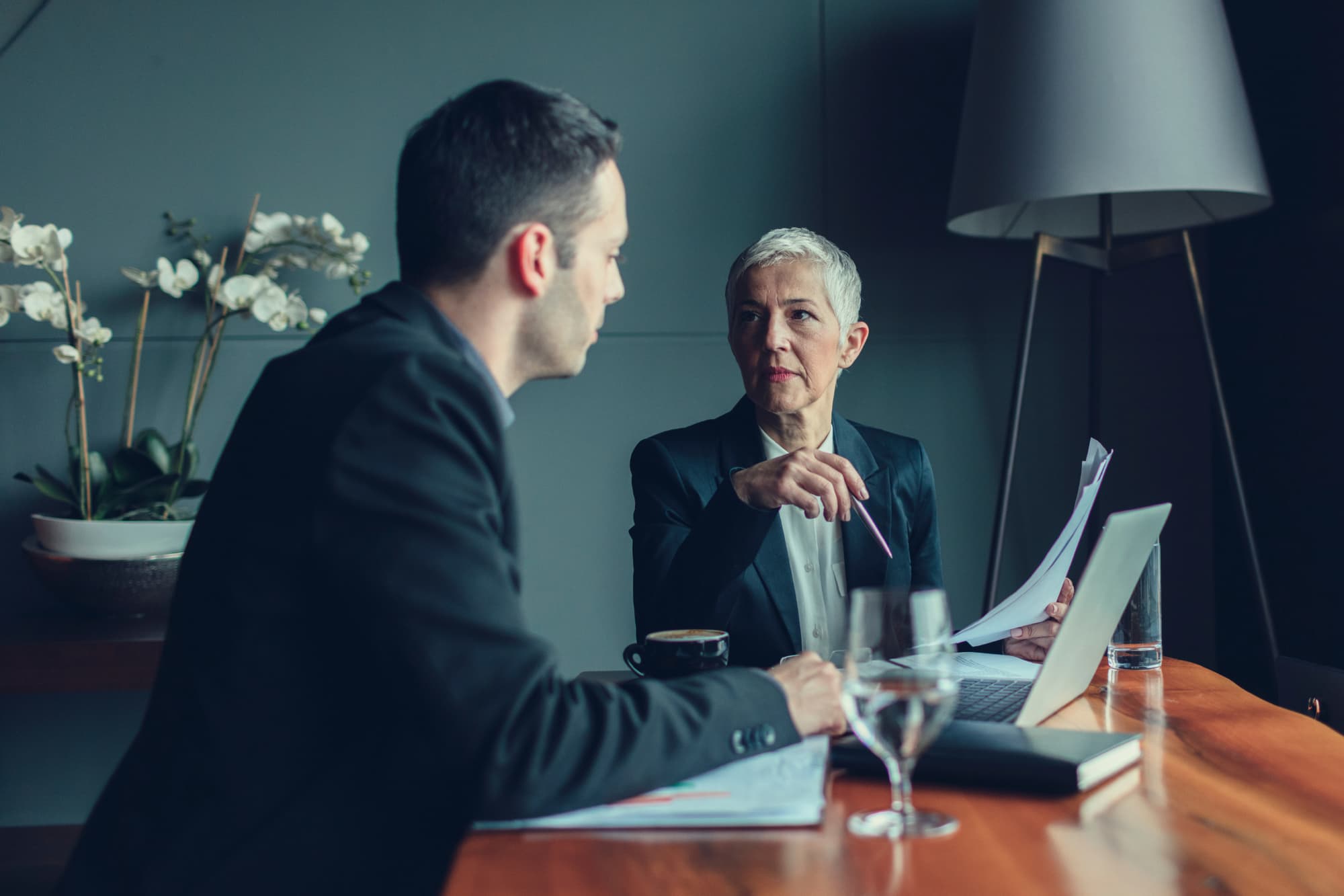 To serve a company in South Dakota, legal documents must be given to key company officials like the president, partner, or registered agent.