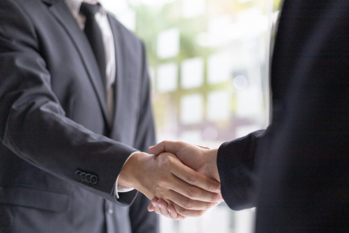 Atlanta legal professionals shaking hands with a Firefly Legal process server.