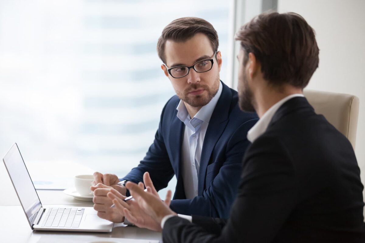 Process server meeting with a Tallahassee attorney to discuss case-specific delivery strategies.
